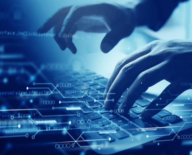 person typing in a keyboard
